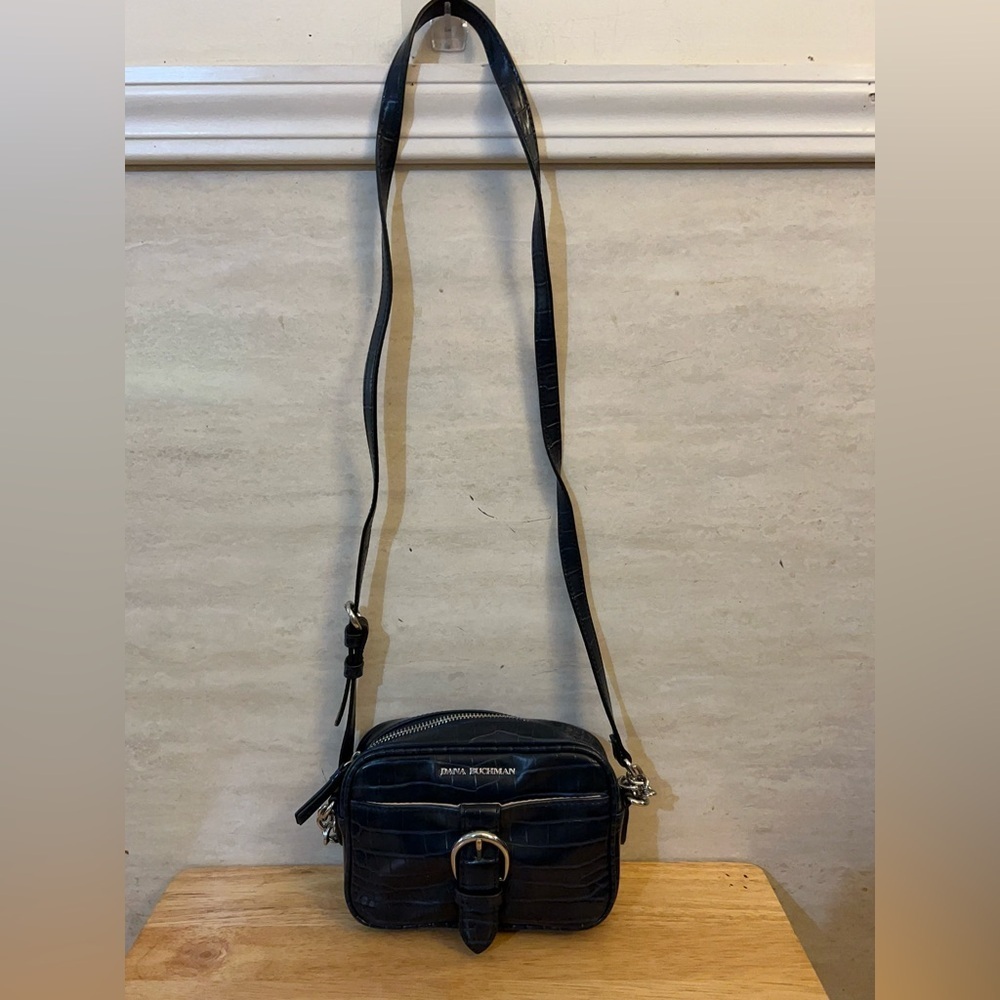 Dana Buchman navy blue crossbody purse features a crocodile-embossed pattern